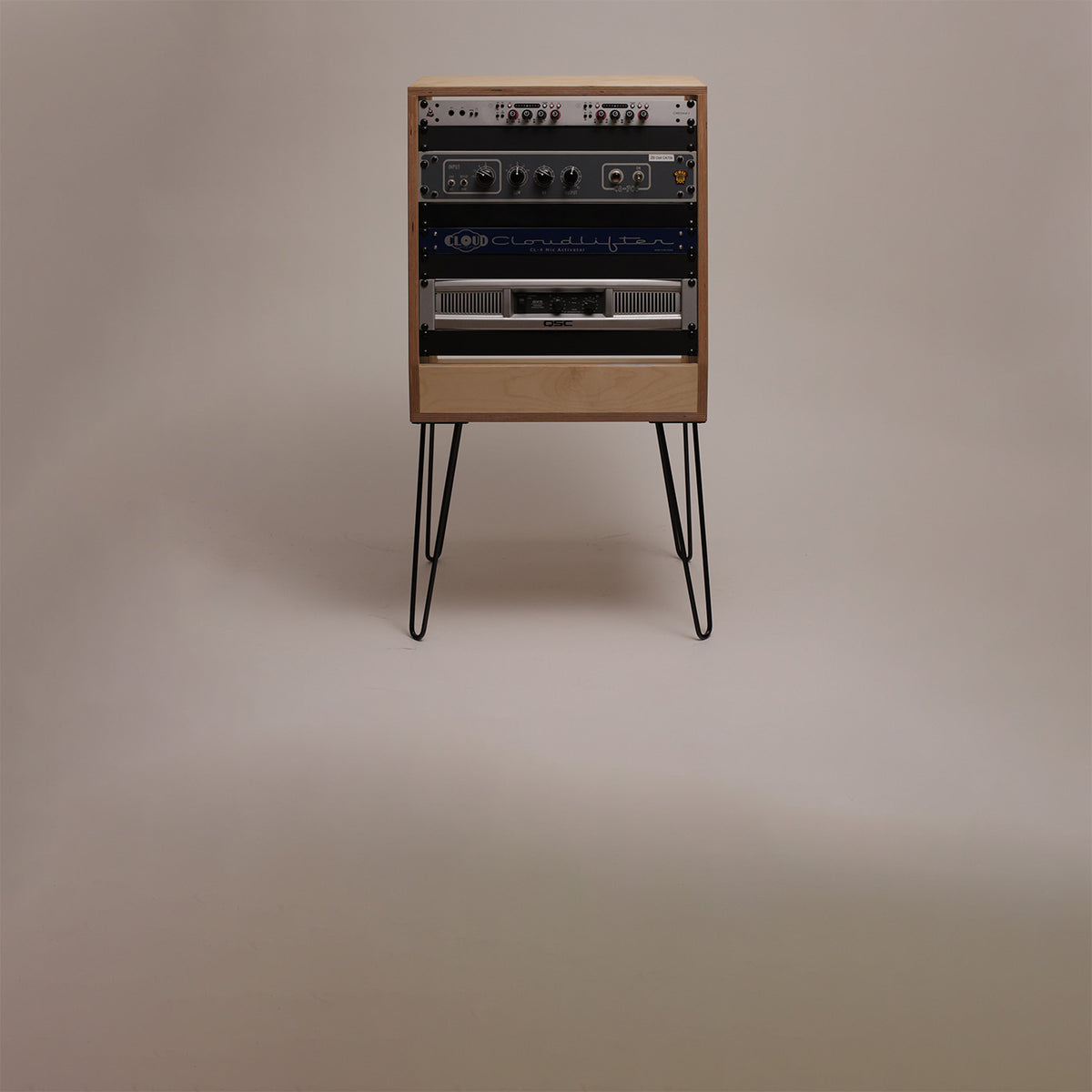 In-stock angled 10U studio rack in Natural on hairpin legs
