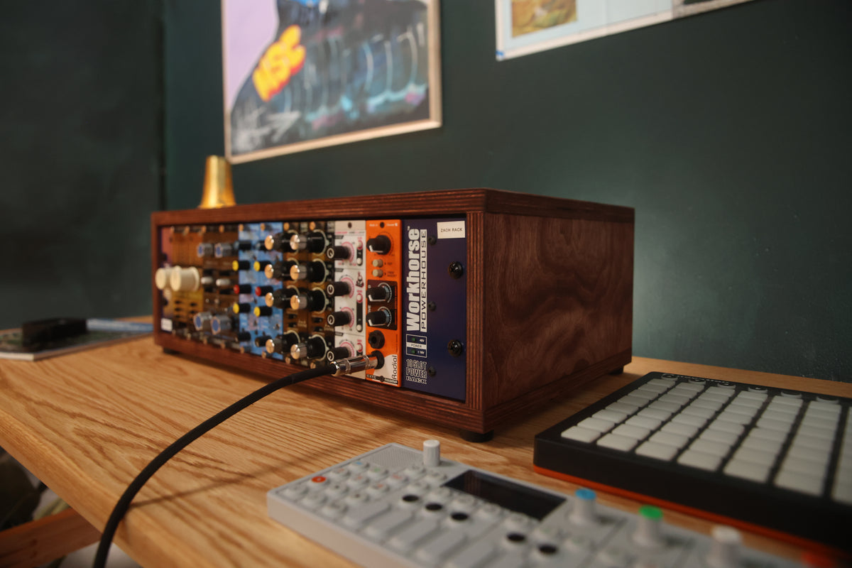 In-stock 3U studio rack in Chocolate holding gear in a home studio