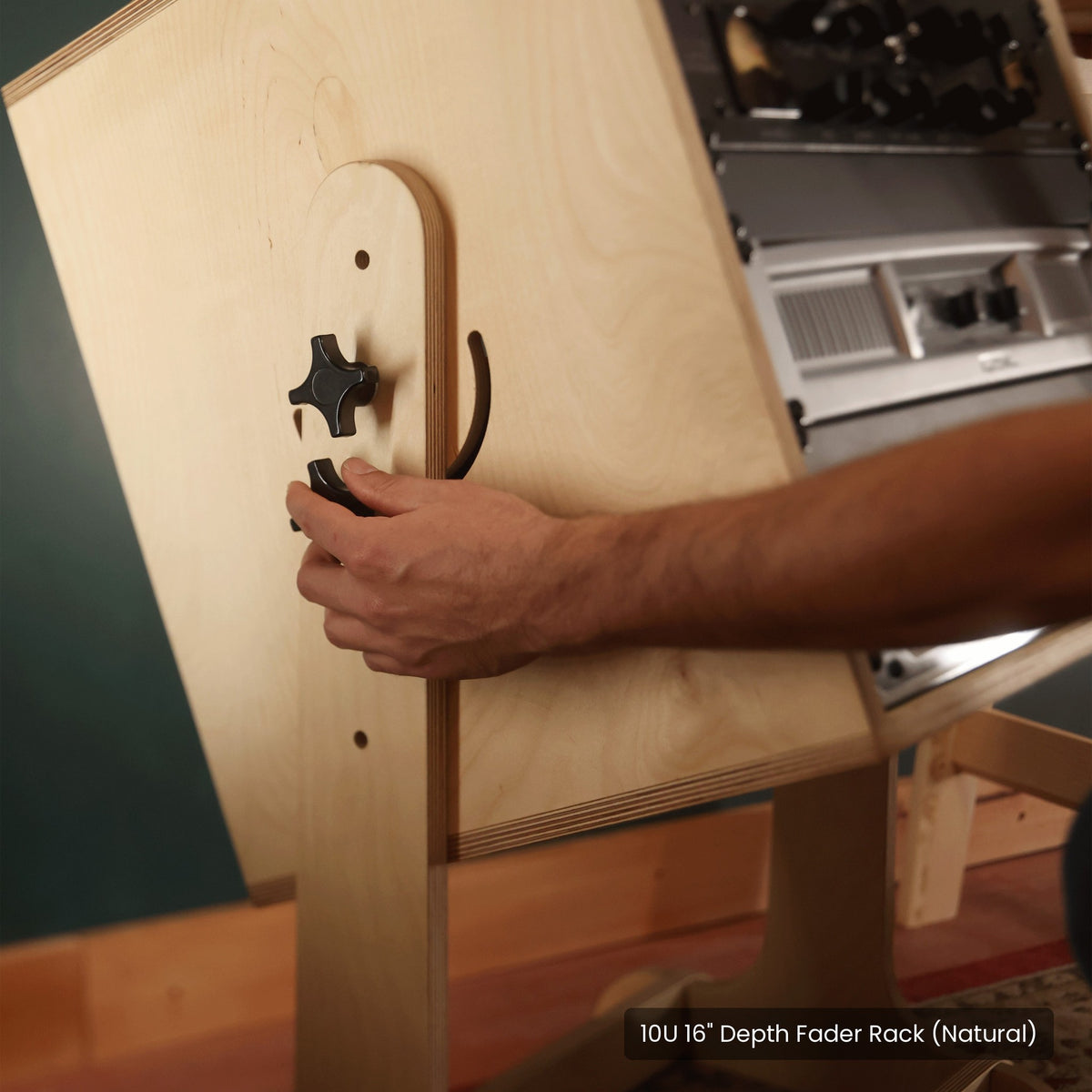 Hand tightening the knob that locks the rack angle and height